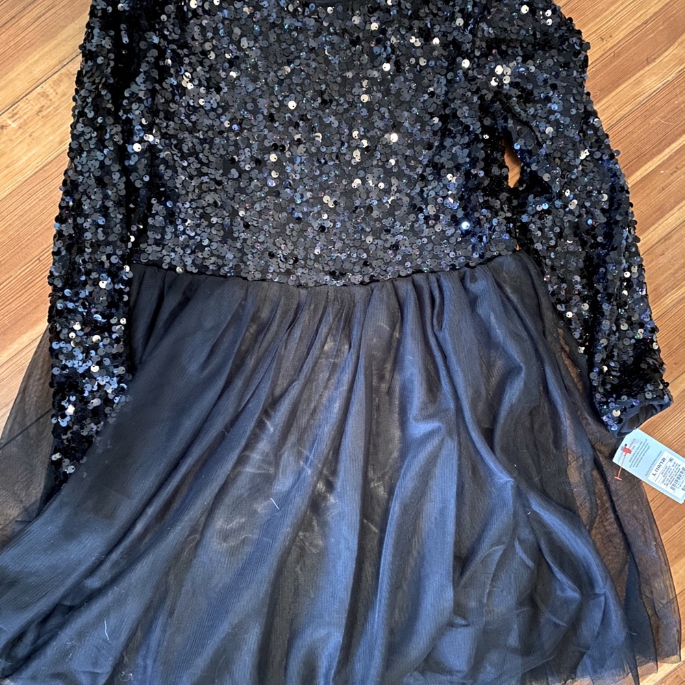 *New* girls dress with tags. Ordered 2 on accident